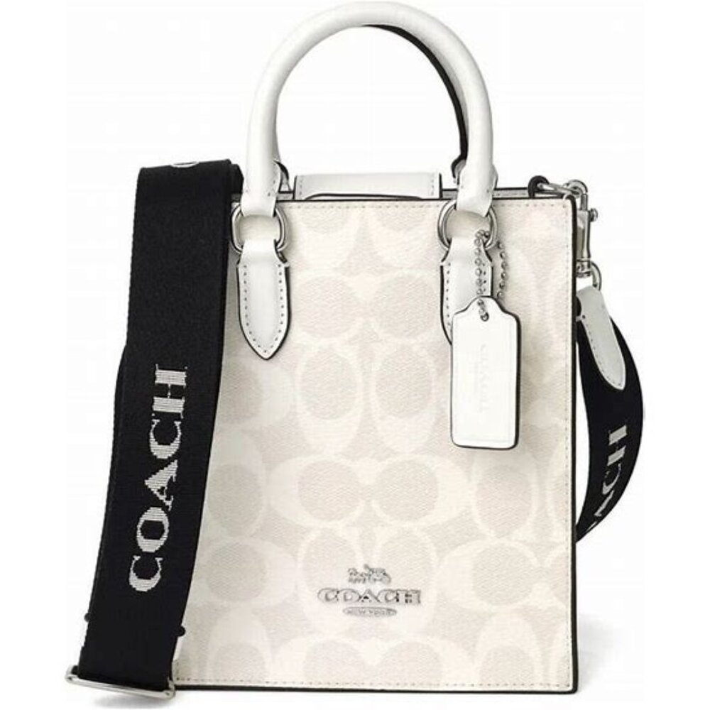 NORTH SOUTH MINI TOTE IN SIGNATURE CANVAS
